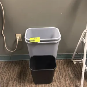 Poly office trash cans. Features molded polyethylene construction. Includes gray rectangular wastebaskets and a black square wastebasket.