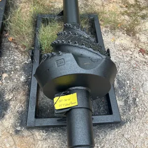 24" fluted reamer. Features spiral flutes with carbide cutting teeth and integrated fluid ports. Stamped 24EC. Includes steel storage frame.
