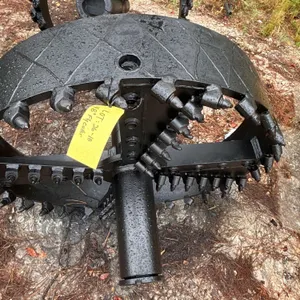 48" fly cutter HDD reamer. Features welded carbide bullet teeth, fluid ports, and central shaft. Dimensions: 48" diameter. Background items not includ