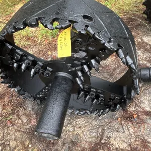 42" fly cutter HDD reamer. Features carbide cutting teeth, cross-hatch hardfacing on the outer barrel ring, open-body design, and integrated shaft.