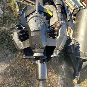 48" mill tooth hole opener. Features milled tooth roller cone cutters, integrated stabilizer fins, and a threaded pin connection.