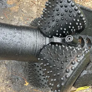 HTI 30" TCI reamer. Features tungsten carbide insert (TCI) roller cones and fluid ports for directional drilling applications. Finished in black.