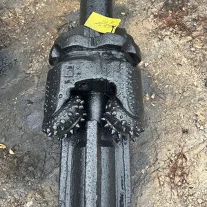 18" TCI rock reamer. Features tungsten carbide insert roller cutters, fluted stabilizer body, and threaded connection.