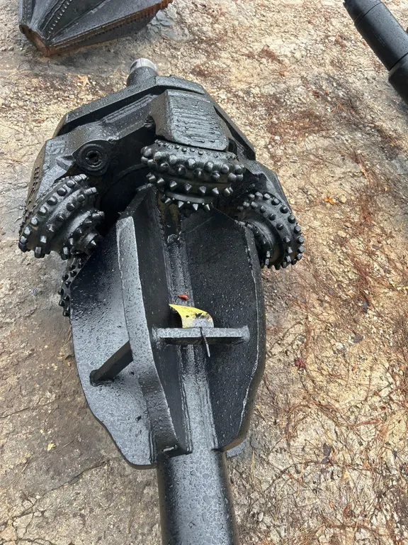 36" TCI reamer. Features tungsten carbide insert (TCI) roller cones and welded steel body construction. Finished in black.