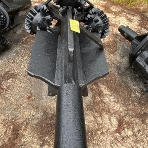 42" mill tooth reamer. Features rotary mill tooth roller cutters, welded stabilizer flutes, and threaded tool joint shaft connections.