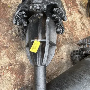 34" mill tooth reamer. Features a fluted body with multiple milled tooth roller cone cutters.