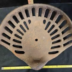 Implement seat, antique, stamped 85
