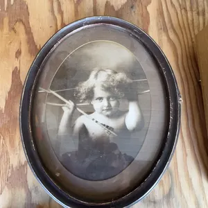 Antique Black and White Portrait of Child in Oval Wood Frame Under Glass