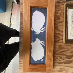 Folk Art Framed Painting With Two White Rabbits on Black Background