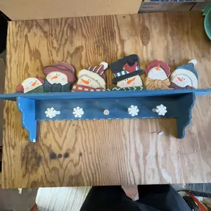 Wooden Winter Snowman Theme Coat Rack with Four Snowflake Pegs and Decorative Shelf