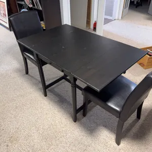 Black Dining Table With Drop Leaf And Two Black Faux Leather Side Chairs