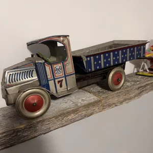 MAR Big Silver Lithographed Tin Toy Dump Truck with Red Wheels