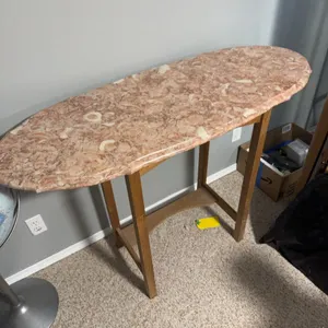 Fossil Stone Oval Table With Pink Marble Top On Wooden Base, 42in x 16in x 30in