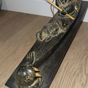 Inuit-Style Carved Kayak Sculpture with Hunter, Walrus, and Seal Figures