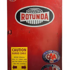 Rotunda Metal Wall Cabinet With CAA Decals and Automotive Supplies