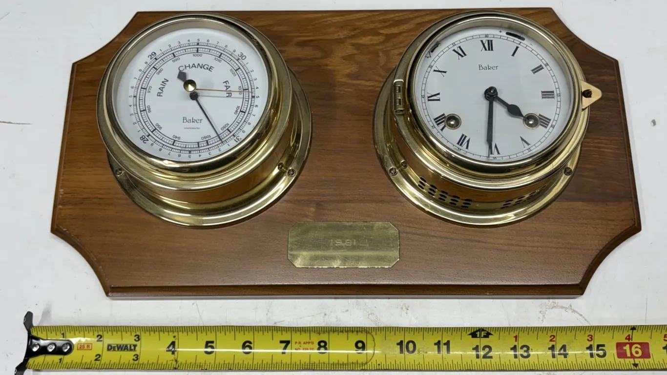 Vintage nautical-style weather station and clock set mounted on a polished wooden wall plaque, featu