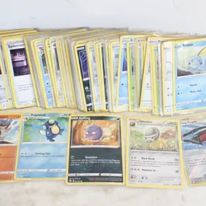 LOT OF 100+ POKEMON CARDS IN PLASTIC SLEEVES