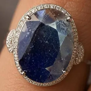 $350, silver.(5.68g), sapphire (5ct)ring, size , retail value $350, ring resizeable for $50