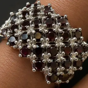 $400, silver.(9g), garnet (2.8ct)ring, size , retail value $400, ring resizeable for $50