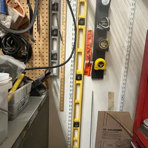 (3) Levels and (4) Tape Measures