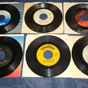 6 Assorted 45 RPM Records Eagles John Denver Linx