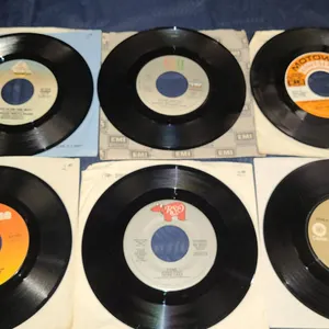 Six 45 RPM Records: Cash, Campbell, Cara, Isley, AWB, Stanley