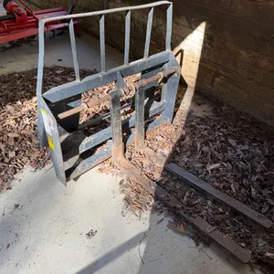 Worksaver Skid Steer Pallet Fork Attachment with Hay Bale Backstop – Quick Attach