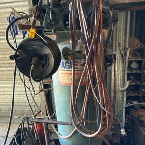 Large air compressor and hose reel