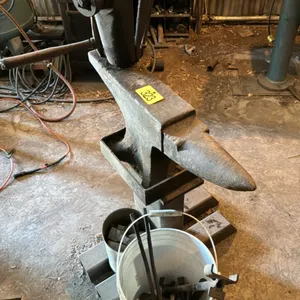 Anvil on stand with vice